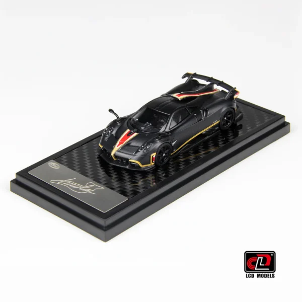 LCD 1:64 Pagani Imola Carbon Black with Red and Gold Stripes